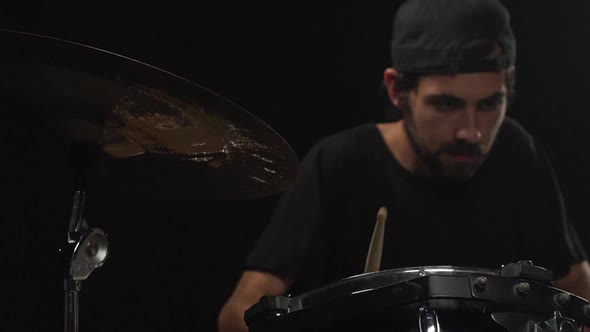 Man Playing on Drum Kit Focus on Drums Slow Motion