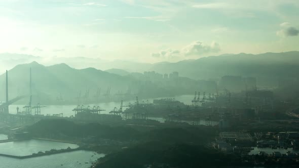 Timelapse Modern Hong Kong Harbour with High Cranes at Dawn