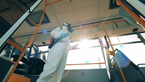 Inside View of a Bus Getting Chemically Decontaminated