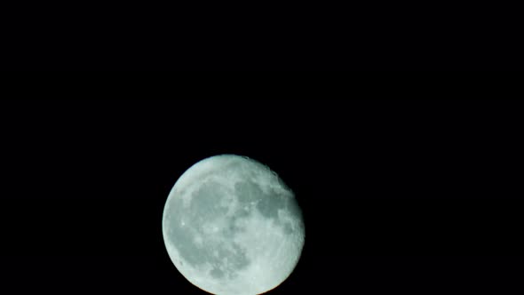 Moon panning across night sky