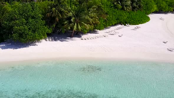 Aerial drone nature of resort beach trip by blue ocean with sand background