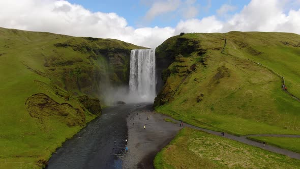 Drone flying over Skogafoss waterfall in Iceland, Europe