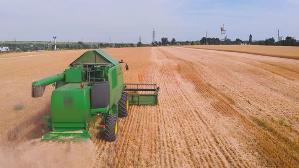  Impressive Flight Over a Working Combine Harvesting Tons of Ripe Barley