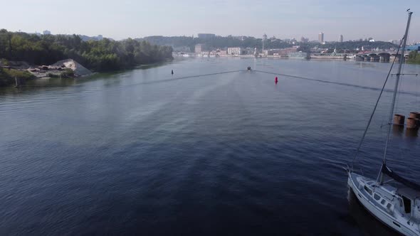 A Dry Cargo Ship Pushes an Empty Barge Down the Dnieper River