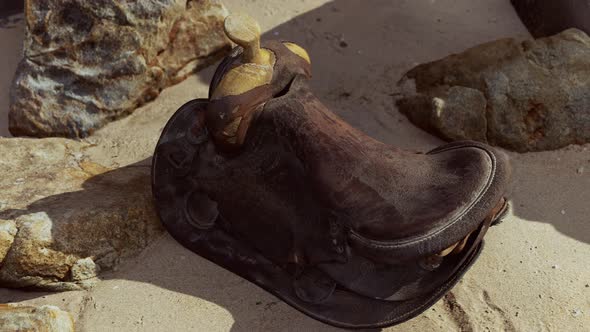 Very Old Horse Saddle on Sand Beach