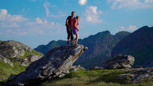 Father and Daughter Are Traveling in the Mountains