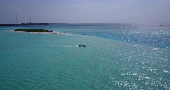 Natural fly over abstract shot of a sandy white paradise beach and aqua turquoise water background i