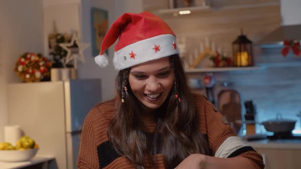 Cheerful Caucasian Woman Opening Presents From Friends