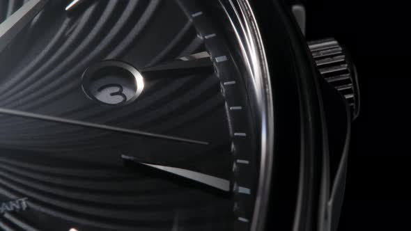 Closeup of Rotating Black Luxury Swiss Watch