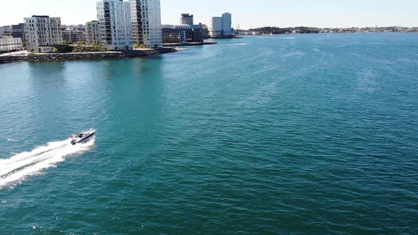 Fast boat driving by the city of Stavanger in the summer of Norway 2018