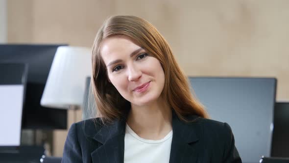 Woman Talking to Camera, Online Video Chat in Office
