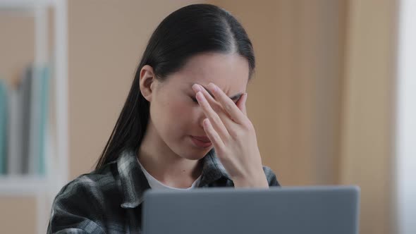 Portrait Asian Girl Freelancer Woman Looking at Laptop Screen Working Remotely Feeling Tired