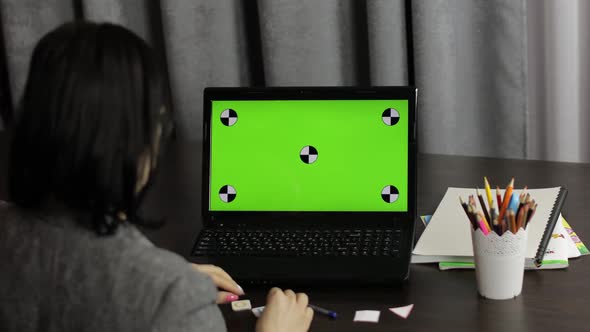 Woman Teacher Making Online Distance Education Video Call on Laptop Green Screen