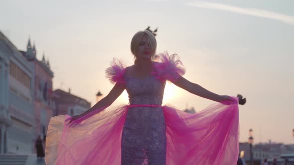 Girl with Pink Dress Poses in Venice