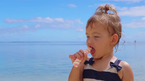 Adorable Little Girl on Warm and Sunny Summer Day in Positano Town in Italy on Amalfi Coast