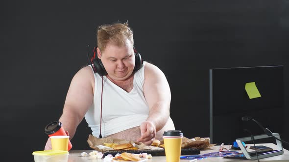 Plump Computer Programmer Browsing the Net