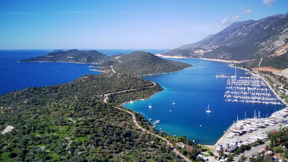 The top view from the drone of Kas resorts, bay, yahts, city in Mugla in Turkey