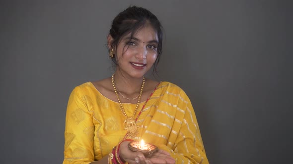 Indian girl in Indian saree with diwali diya. Diwali is biggest festival of India. Diwali is festiva