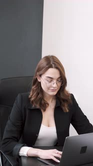 Young Pretty Smart Woman Working at Office