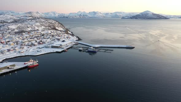 Coastal city covered with snow, Tromso, Norway