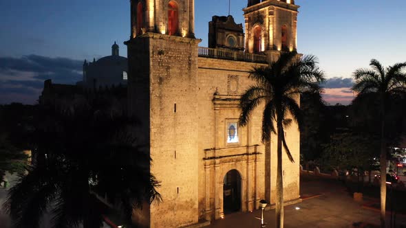 Nighttime aerial ascent from corner of church showing closeup of the Cathedral de San Gervasio in Va