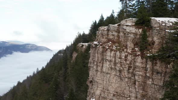 Aerial of mountain ridge in Creux du Van, Switzerland