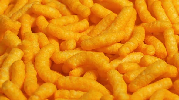 Bowl Of Cheese Puffs Chips Rotating