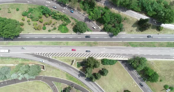 Aerial top down view of street traffic. Highway intersection.