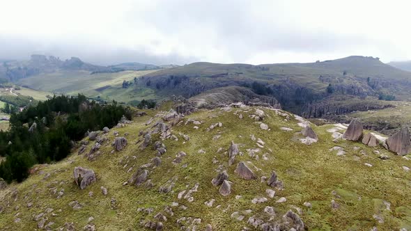 Panoramic View Of The Rock Formation On Green Hills In Cumbemayo At Peruvian City Of Cajamarca. aeri