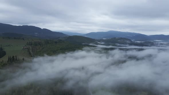 Ukraine, Carpathians: Fog in the Mountains. Aerial.