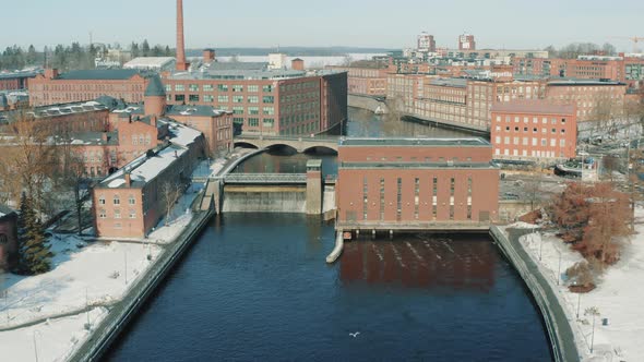 Drone footage of the rapids and dam in the center of Tampere