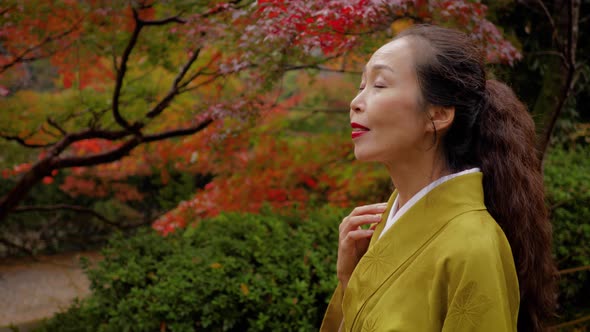 Japanese woman walking in the forest in Kyoto Japan