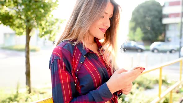 Young woman using smartphone