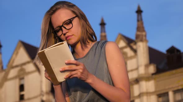 Hipster Girl Writing Something in Her Notebook.