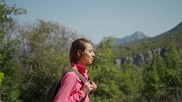 Slow Motion Pretty Young Woman Hiker Walking on Beautiful Mountain Landscape Happy Girl Hiking