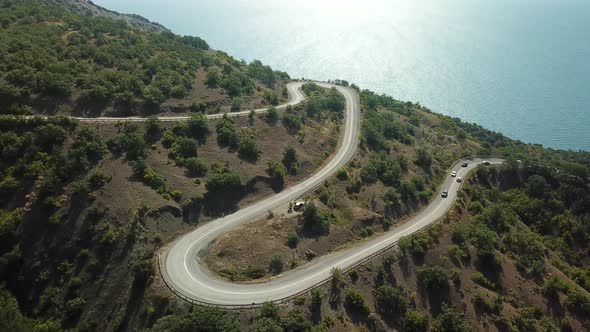 A Winding Road Through the Crimean Mountains Along the Sea