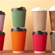 A lot of disposable cups for coffee and tea change places. - VideoHive Item for Sale