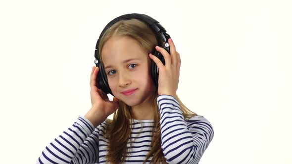 Girl Dj Wears Headphones on Head. Slow Motion, Close Ups