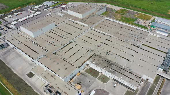 Aerial view of warehouse storages. Aerial view of industrial buildings and equipment machines