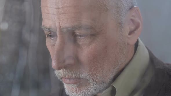 Miserable Elder Looking Into Camera Heavily Sighing, Unprotected Poor Retirement