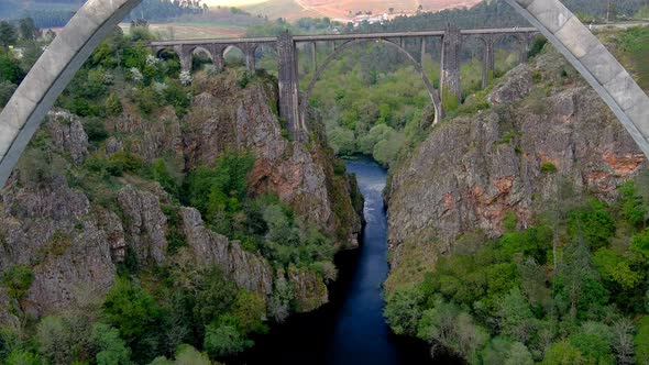 View Of Gundián Viaduct spanning Ulla River With Drone Flying Back Underneath New Ulla viaduct. Pede