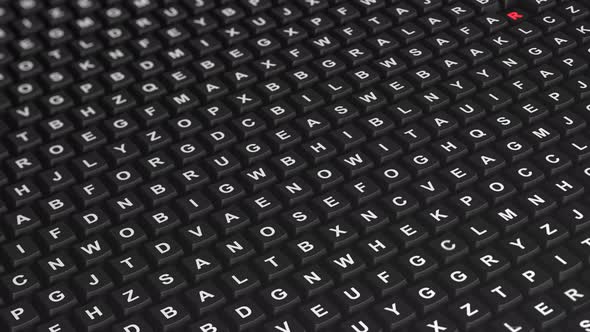 Surface of White Text on Black Keyboard Keys Being Pressed and Lighting up in Red, Green, or Blue alt