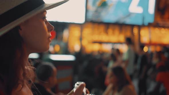 Attractive photographer in Times Square in New York City