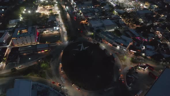 High Angle View of Cars Driving on Large Roundabout