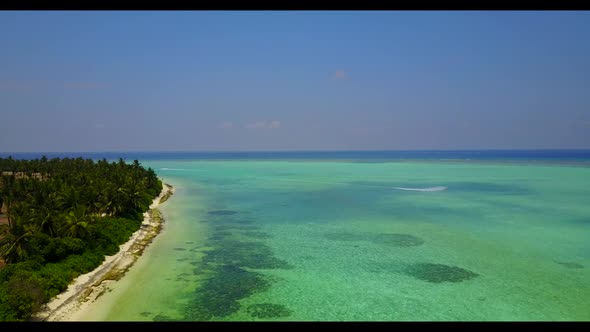Aerial top down tourism of perfect tourist beach lifestyle by blue water with white sand background 