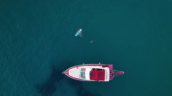 A large yacht stands at sea aerial view 4 K