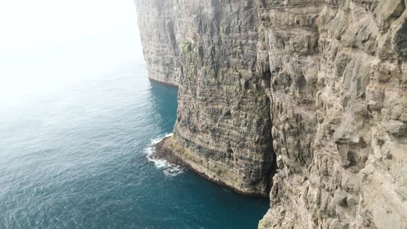 Beautiful View of Foggy Traelanipan Slave Mountain in Vagar Faroe Islands