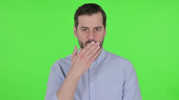 Portrait of Man Giving Flying Kiss Green Screen