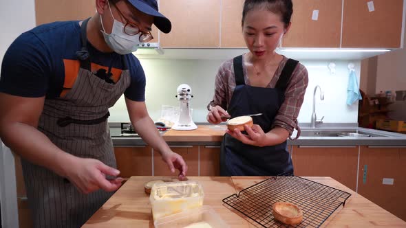 Young bakers preparing delicious tarts at home