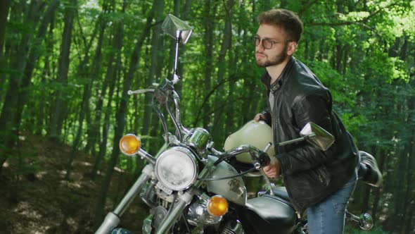 Man sitting on a motorcycle